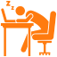 A person sitting at a desk with a computer.