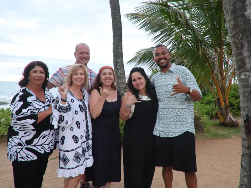 A group of people standing next to each other.